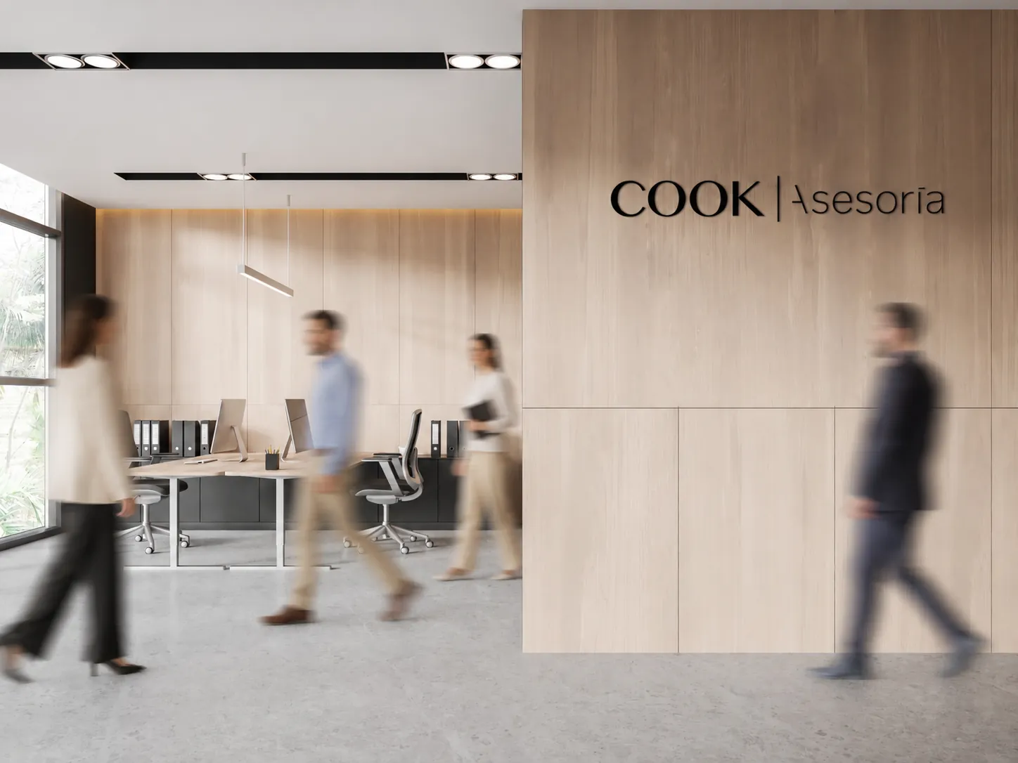 Espacio de trabajo con la marca COOK Asesoría en una pared de madera